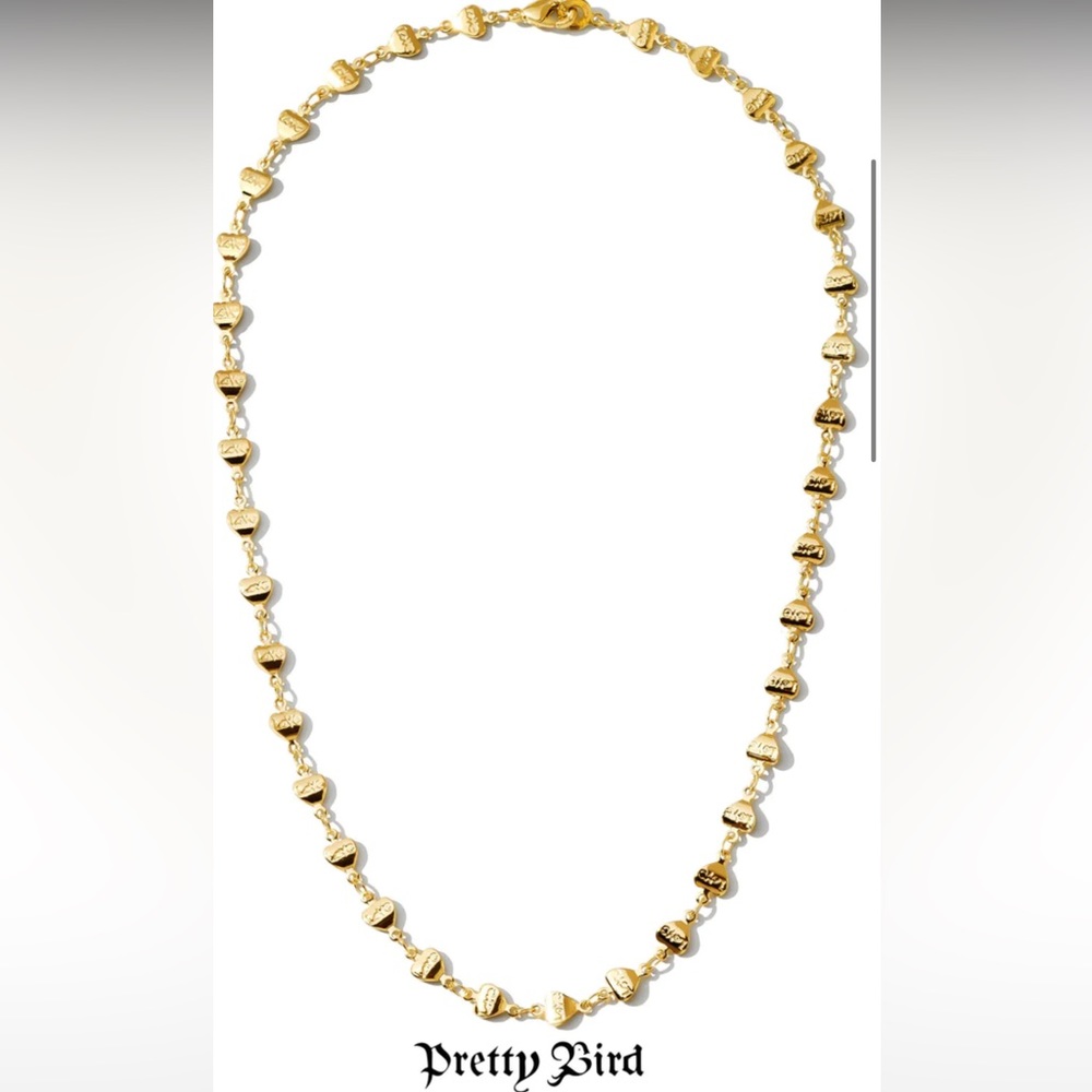 Gold Love letter necklace by pretty bird jewelry